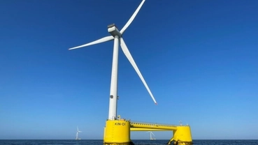 Floating wind turbine positioned offshore in deep water