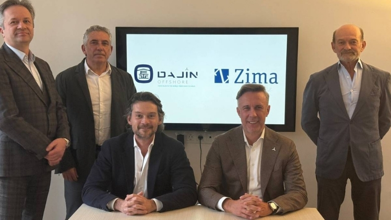 Executives from Dajin Offshore and Zima posing after signing an offshore wind cooperation agreement