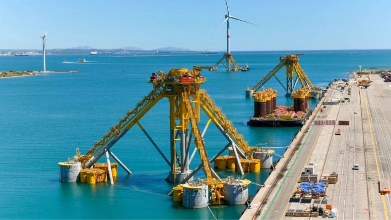 Floating offshore wind turbine foundations staged at port facility